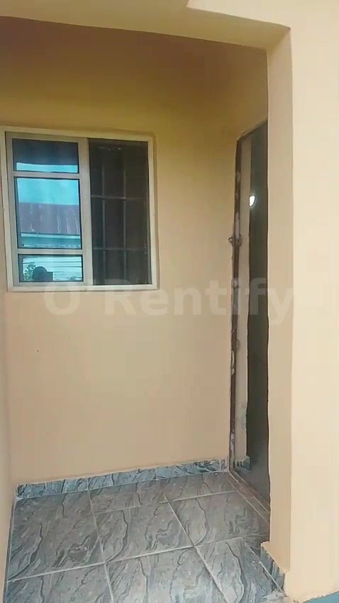 A room and parlour self contain with necessary facilities to let , Rent is 400k without service charges