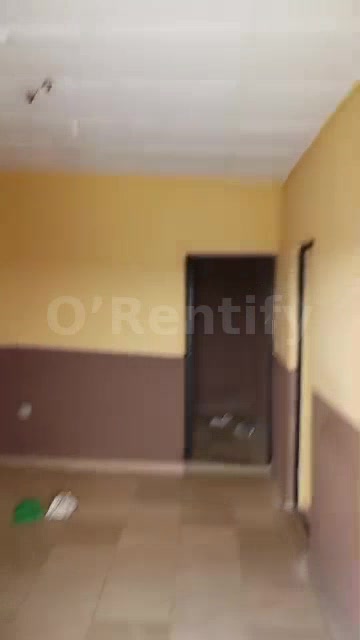 2bed room flat at arogunmosa fully tiles running water not fenced ceiling 500k basic rent wardrobe, kitchen cabinet... A photo 3