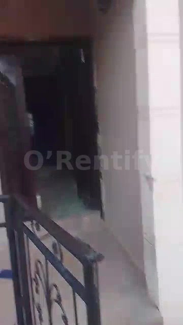 2 bed room flat is available at Awokose area owode llesa rent 500k running with water fully tiler half Pop kitchen cabin